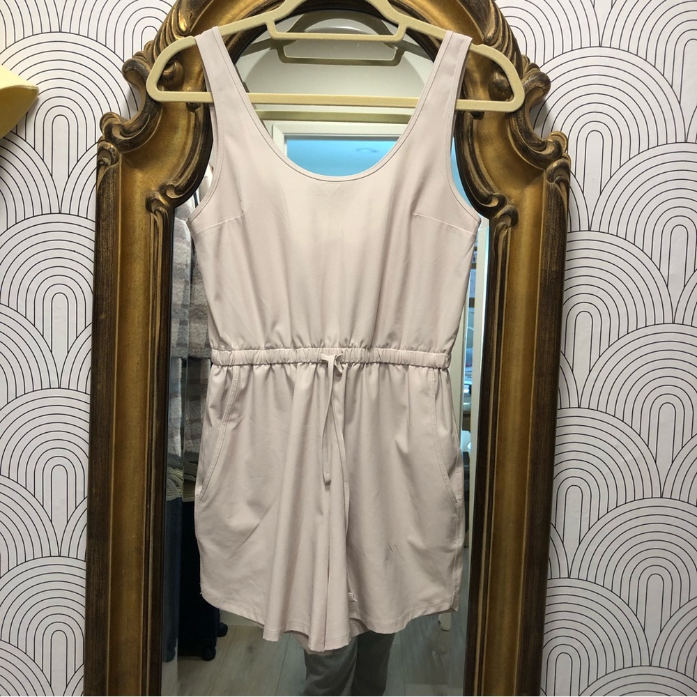Abercrombie // sleeveless traveler romper in bone light beige